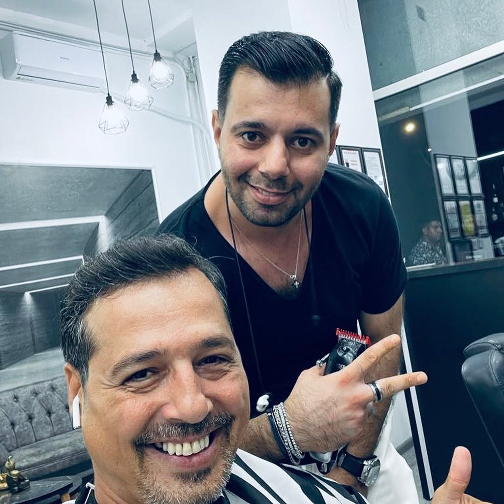 Barber și client la Heruvim Barber Shop